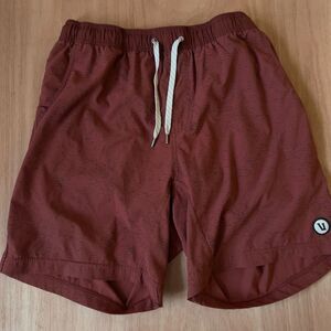 Vuori Men's Athletic Shorts in Rust Red